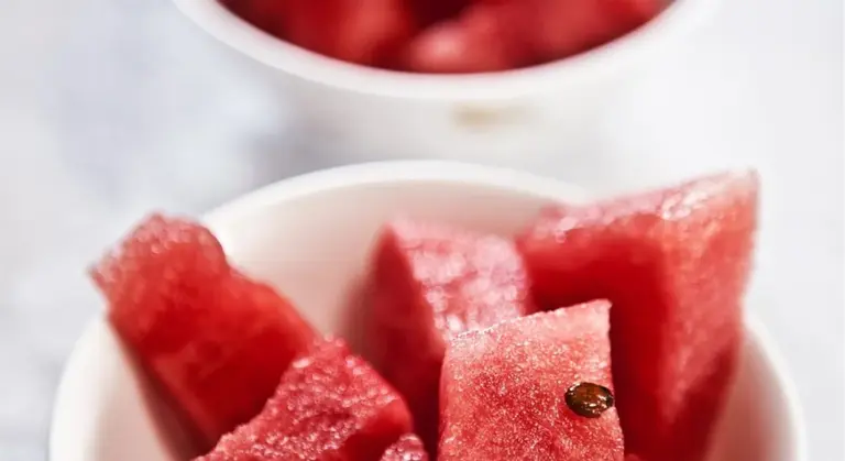Watermelon pieces in a white bowl